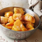 Bourbon Sweet Potatoes in a metal bowl
