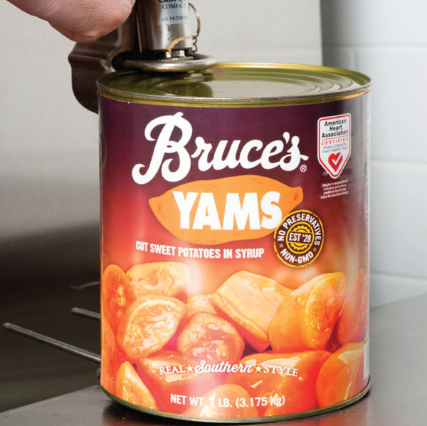 Bruce's-Yams-Can Using a can opener to open a can of Bruce's Yams