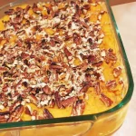 Mrs. Bruce’s Delicious Sweet Potato Casserole in a glass dish