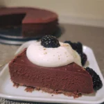 No Bake Chocolate Sweet Potato Torte topped with whipped cream and blackberries