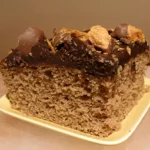 Spicy Sweet Potato Butterfinger Cake on a plate