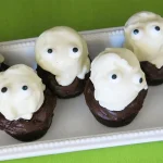 Sweet Potato Brownie Bite Ghosts on a white plate