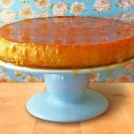 Sweet Potato Flan on a cake stand