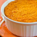 Sweet Potato Pudding in a white dish