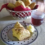 Sweet Potato Scones on a plate with juice